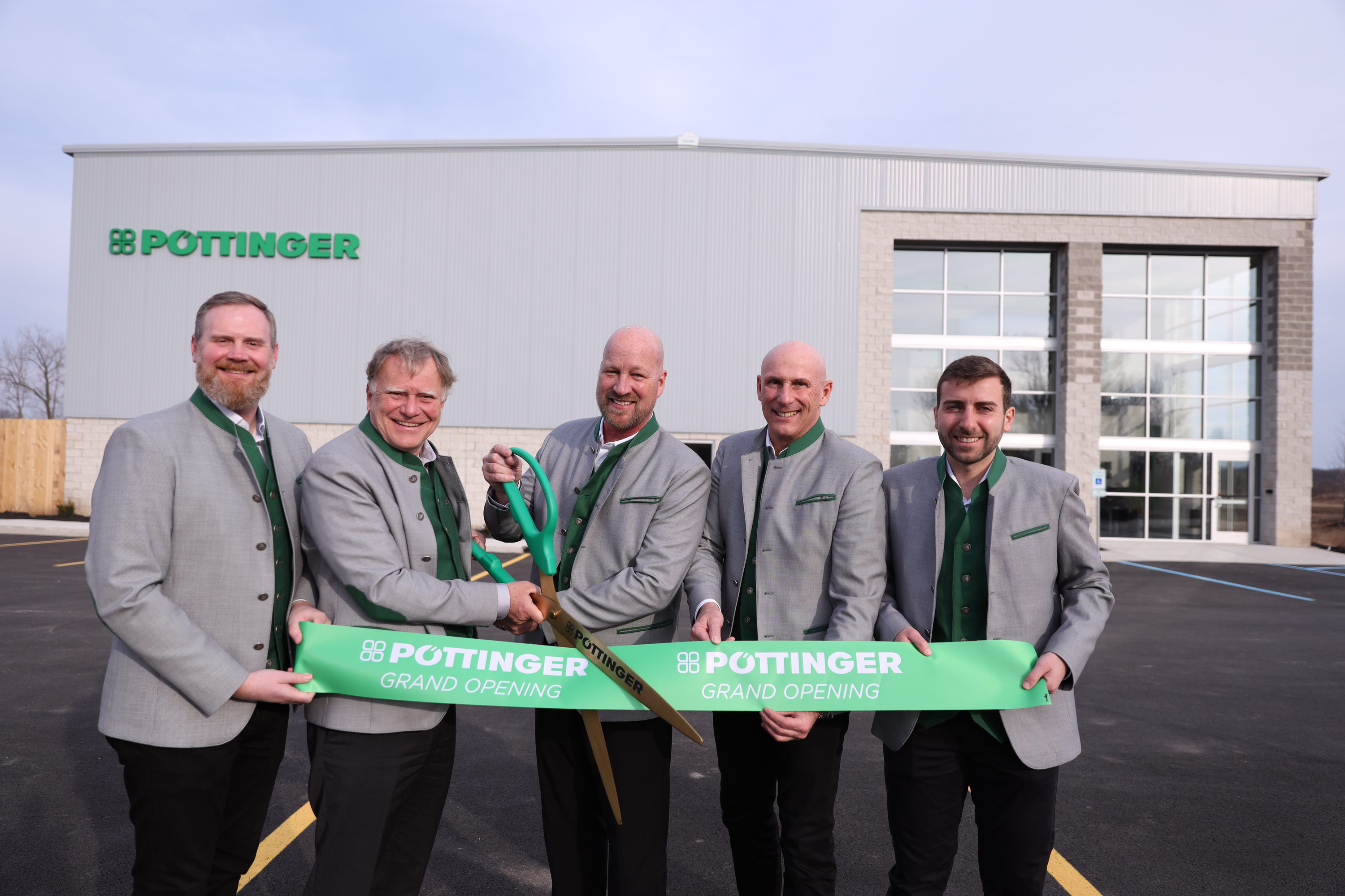 Poettinger ribbon cutting 3